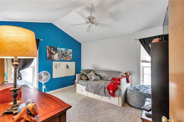 carpeted bedroom featuring ceiling fan and lofted ceiling