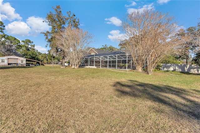 view of yard featuring a lanai