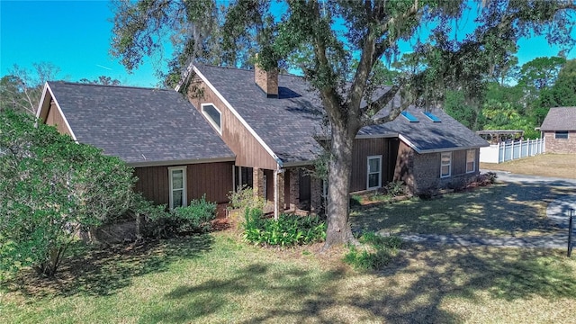 view of front of home with a front yard