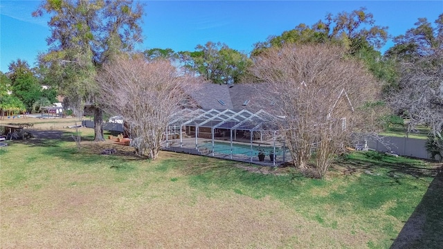 view of yard with a lanai