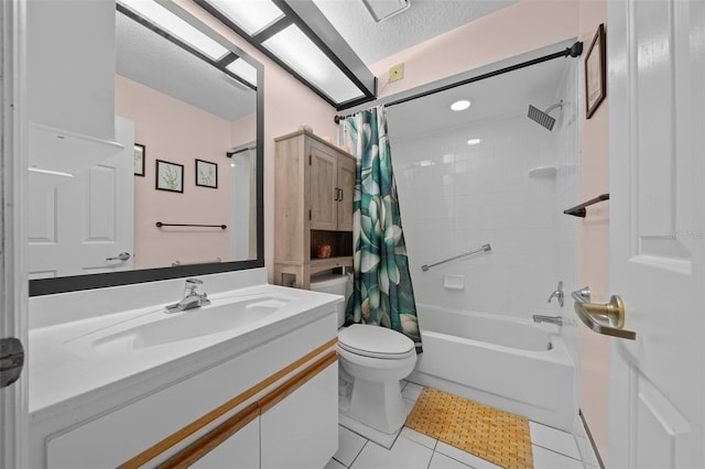 full bathroom with tile patterned floors, toilet, a textured ceiling, vanity, and shower / bath combo with shower curtain