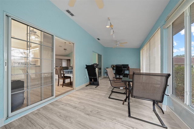 sunroom featuring plenty of natural light and ceiling fan