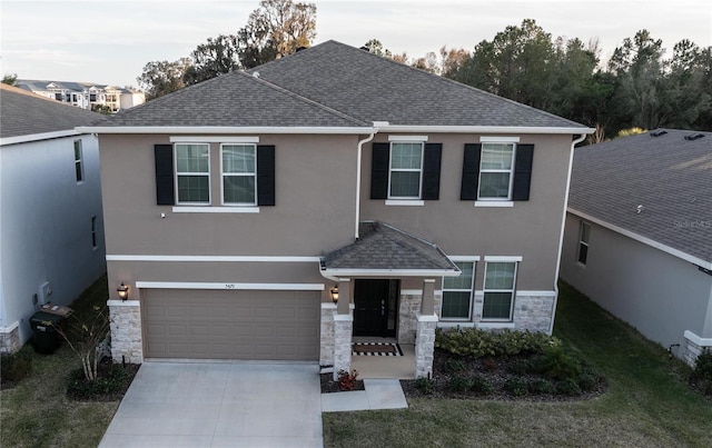 view of front of property featuring a garage