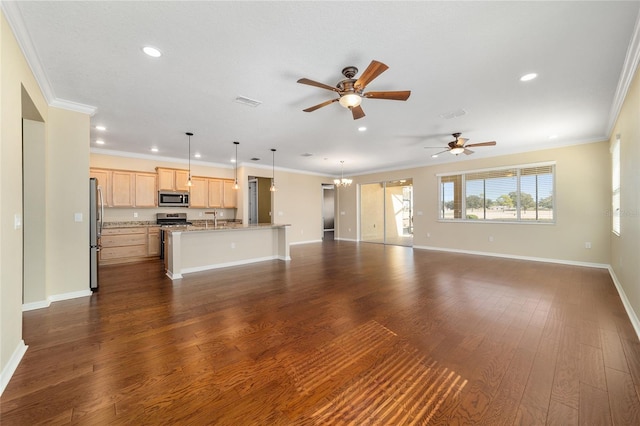 unfurnished living room with dark hardwood / wood-style flooring, sink, ceiling fan with notable chandelier, and ornamental molding