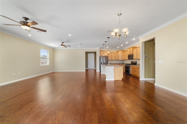 kitchen with sink, a center island, dark hardwood / wood-style floors, pendant lighting, and stainless steel appliances