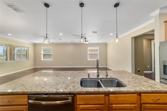 kitchen with dishwasher, light stone countertops, sink, and a wealth of natural light