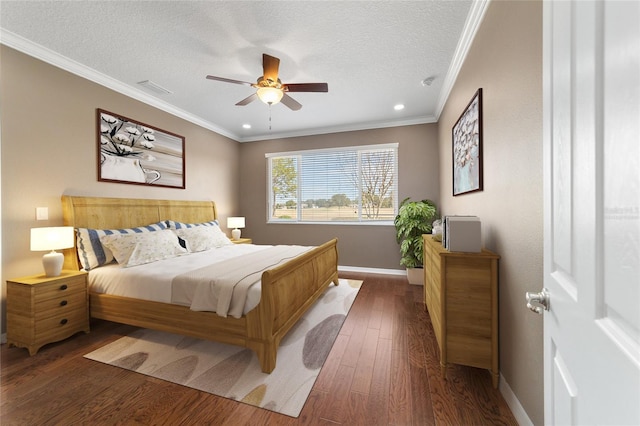 bedroom with crown molding, ceiling fan, a textured ceiling, and dark hardwood / wood-style flooring