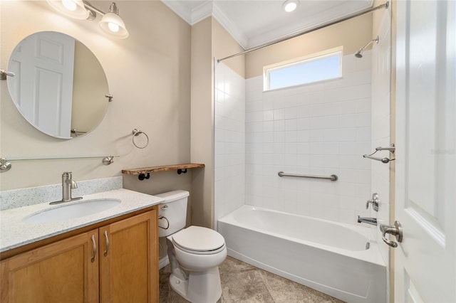 full bathroom with tile patterned floors, toilet, crown molding, tiled shower / bath, and vanity