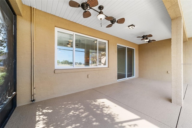 view of patio featuring ceiling fan