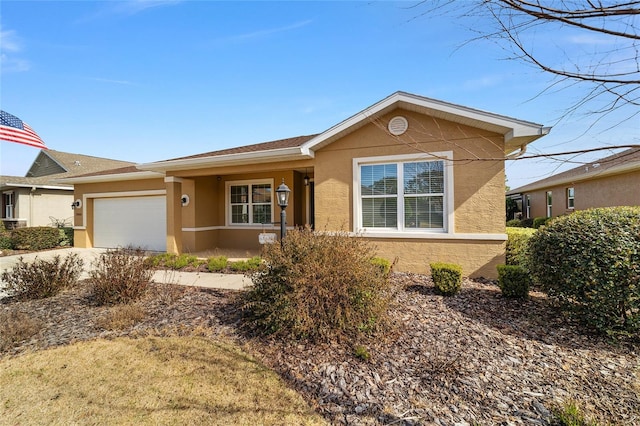 single story home with a garage