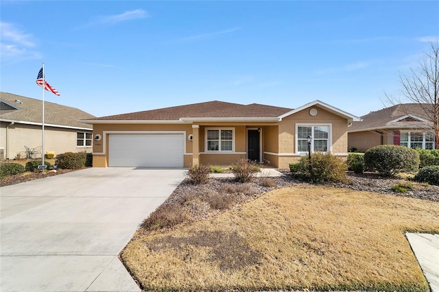 ranch-style house featuring a garage