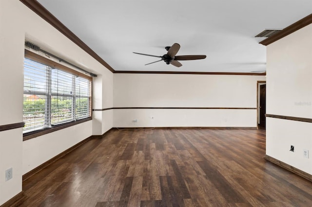 unfurnished room featuring ceiling fan, ornamental molding, and dark hardwood / wood-style floors