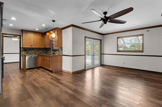 kitchen featuring french doors, stainless steel dishwasher, dark hardwood / wood-style flooring, pendant lighting, and backsplash