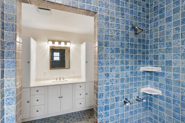 bathroom featuring vanity and tile patterned flooring