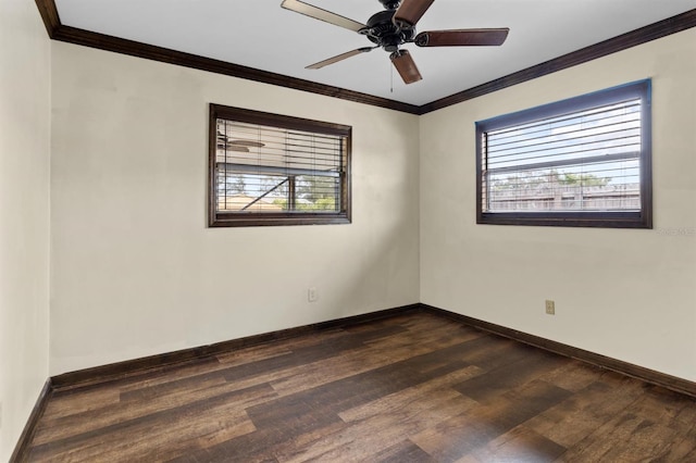 empty room with dark wood-type flooring, ceiling fan, and ornamental molding