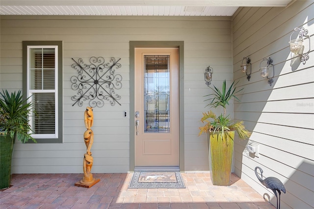 entrance to property with a porch