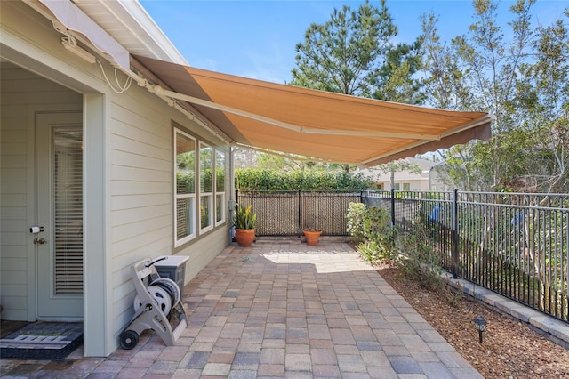 view of patio / terrace with fence