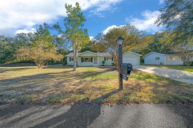 single story home featuring a front yard and covered porch