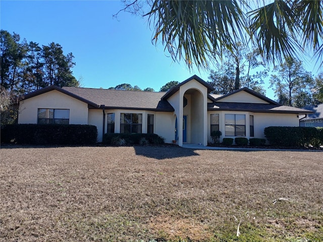 single story home with stucco siding