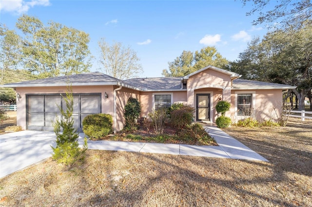 ranch-style house featuring a garage