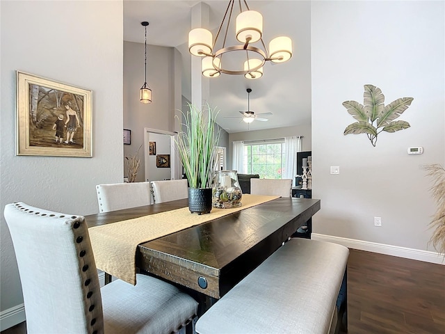 dining area with dark wood-type flooring, high vaulted ceiling, and ceiling fan