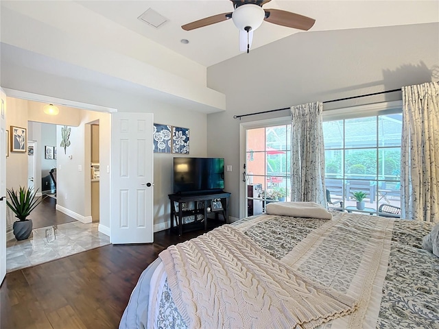 bedroom featuring dark hardwood / wood-style floors, ceiling fan, and access to exterior