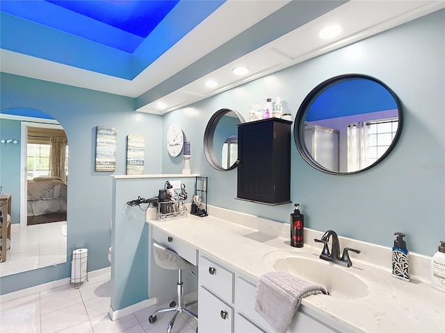 bathroom with vanity, tile patterned floors, and toilet