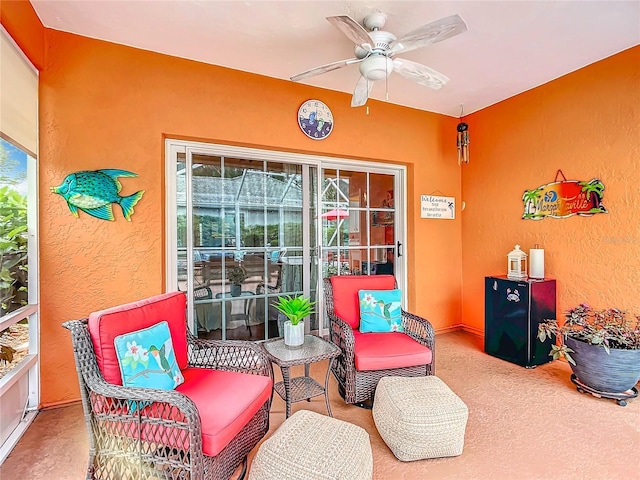 view of patio featuring ceiling fan