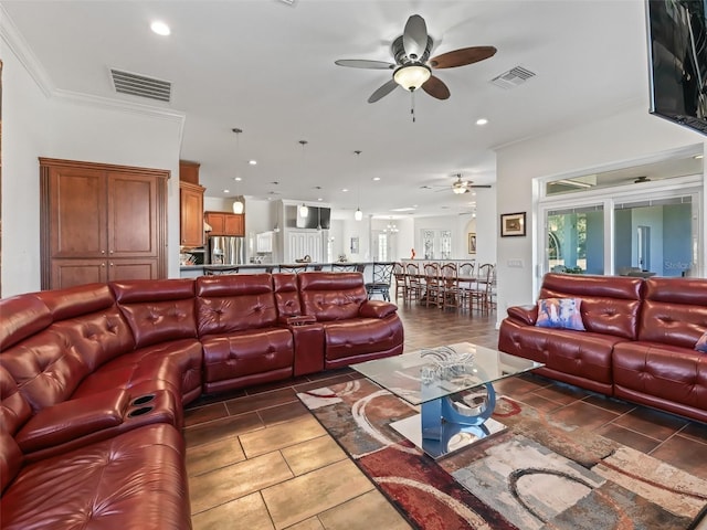 living room featuring crown molding and ceiling fan