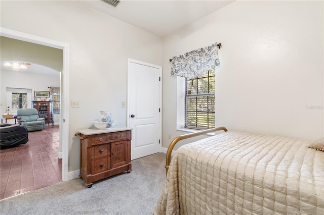 bedroom with light carpet