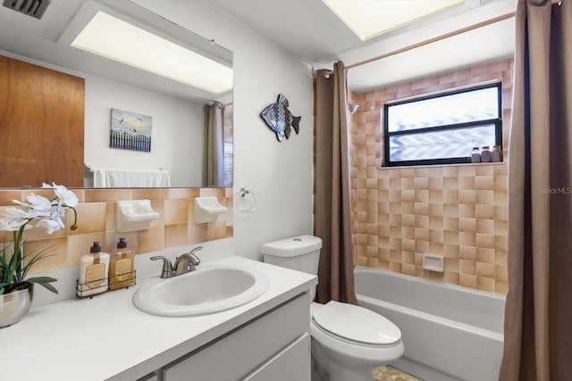 5570 W Cagney Loop, Homosassa, FL 34448 - bathroom featuring toilet, shower / bathtub combination with curtain, vanity, and backsplash