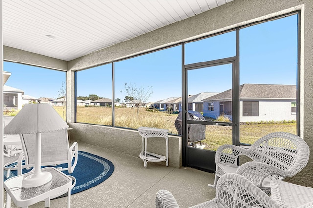 sunroom with plenty of natural light