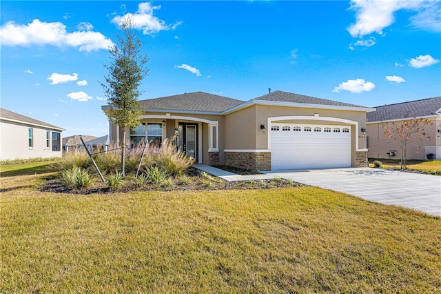 view of front of property with a garage and a front yard