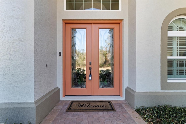 doorway to property featuring french doors