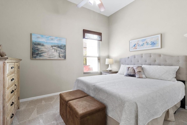 bedroom with ceiling fan and light colored carpet