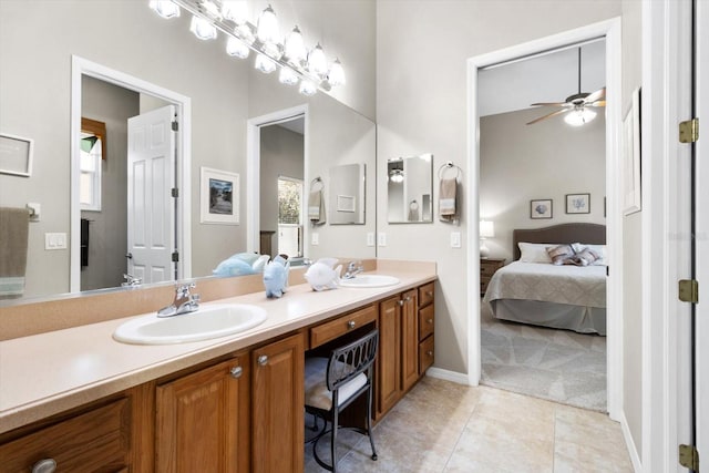 bathroom featuring ceiling fan, tile patterned floors, and vanity