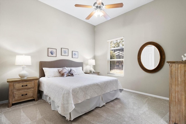 bedroom featuring light carpet and ceiling fan