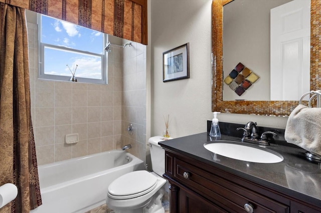 full bathroom with vanity, shower / tub combo with curtain, and toilet