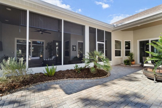 doorway to property featuring a patio area