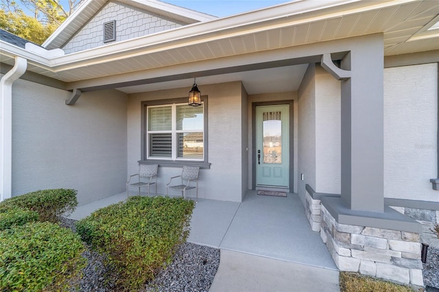 entrance to property with covered porch