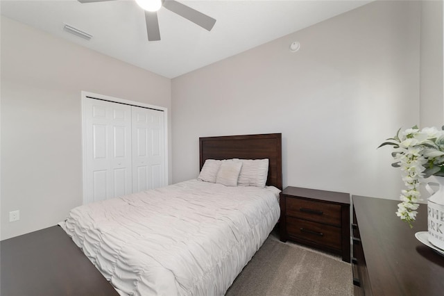 bedroom with light carpet, a closet, and ceiling fan