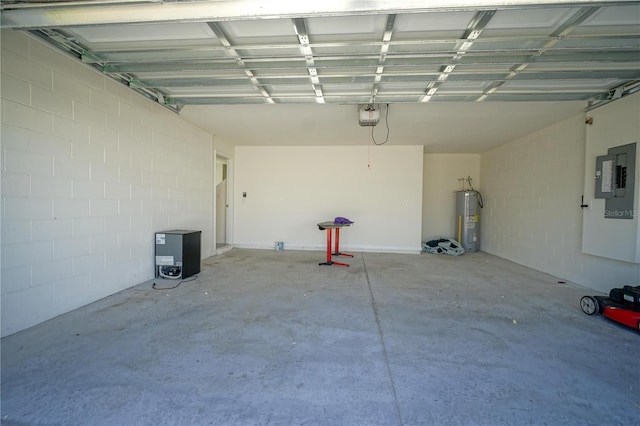 garage featuring electric panel, a garage door opener, and electric water heater