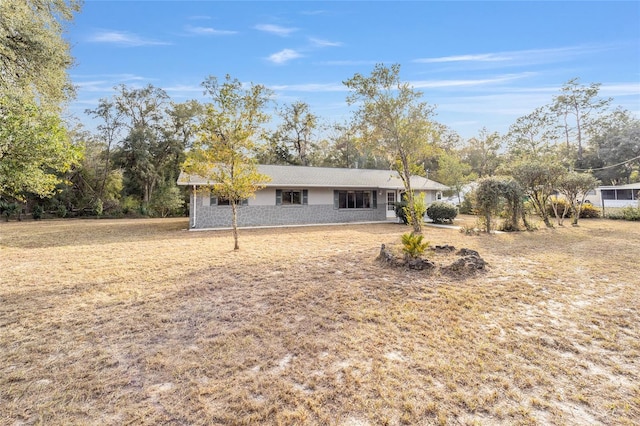 view of front of house with a front lawn