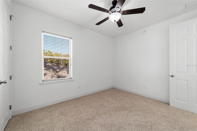 carpeted empty room with ceiling fan