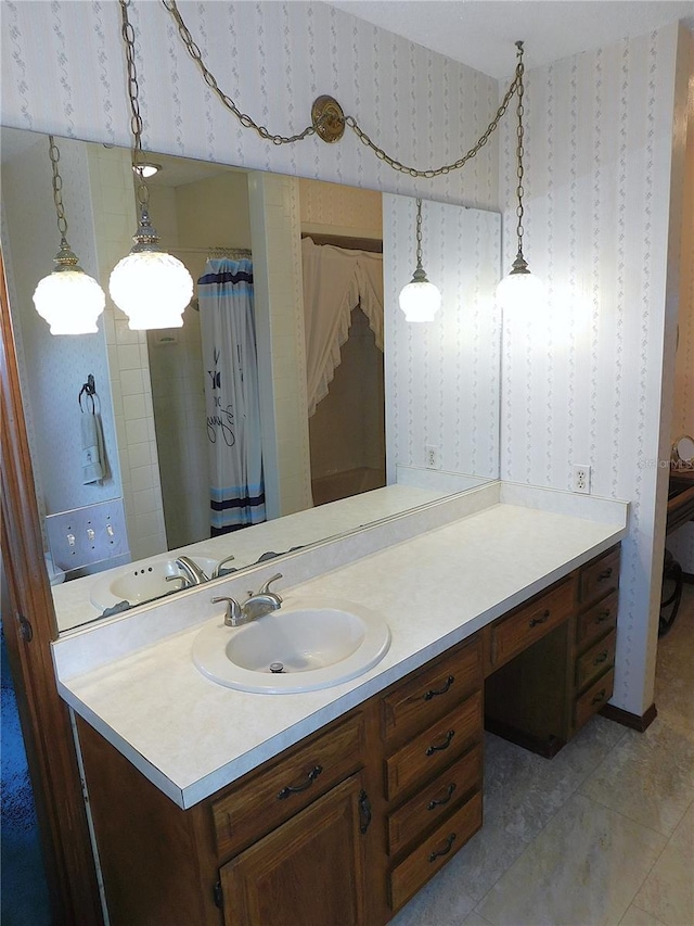 bathroom with vanity and tile patterned flooring