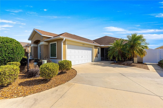 ranch-style home featuring a garage