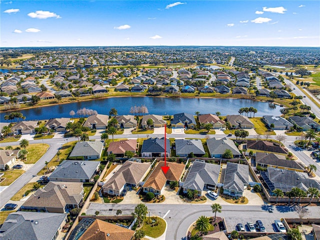 drone / aerial view featuring a water view