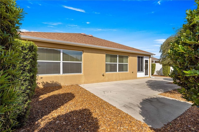 rear view of property with a patio area