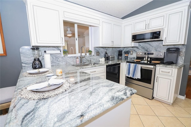 kitchen with white cabinetry, sink, and appliances with stainless steel finishes