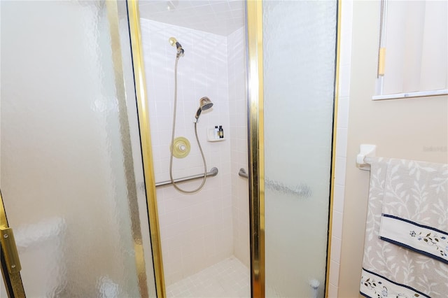 bathroom featuring an enclosed shower